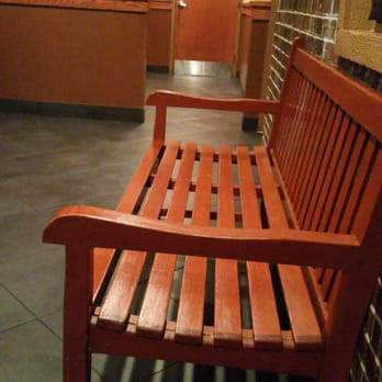 Pizza Hut - a wooden bench in a restaurant - Pizza Near Me - Lanham, Maryland