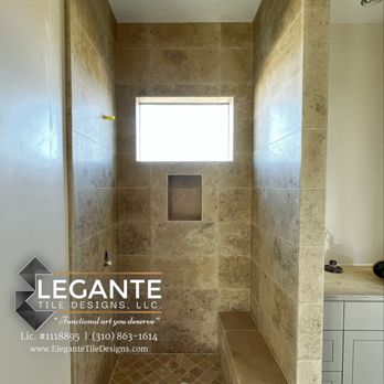 Elegante Tile Designs - Timeless travertine enclosed shower, onsite fabrication of bullnose edges. Joshua Tree, CA. - Tiling Near Me Elegante Tile Designs - Timeless travertine enclosed shower, onsite fabrication of bullnose edges. Joshua Tree, CA. - Tiling Near Me