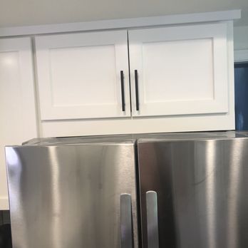 David C Fontan - a stainless steel refrigerator in a kitchen - Painters Near Me - Pacheco, California