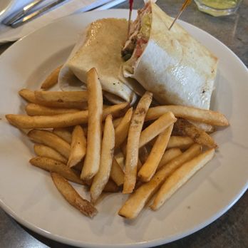 Clara's On the River - Fajita Wrap with french fries. - American Near Me - Battle Creek, Michigan Clara's On the River - Fajita Wrap with french fries. - American Near Me - Battle Creek, Michigan