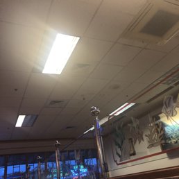 Several light bulbs not working. Dark and gloomy looking inside.