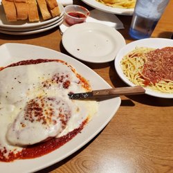 Chicken Parmigiana and side of spaghetti w/meat sauce