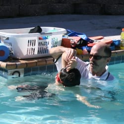 Doug Senz Swim Lessons - Coach Doug in the water teaching quality private swim lessons.
