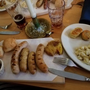 Waldmann Brewery - Wurst sharing plate with bread, condiments, and three sides - limestone potato, spätzle, and dumplings. - Breweries Near Me - Saint Paul, Minnesota Waldmann Brewery - Wurst sharing plate with bread, condiments, and three sides - limestone potato, spätzle, and dumplings. - Breweries Near Me - Saint Paul, Minnesota