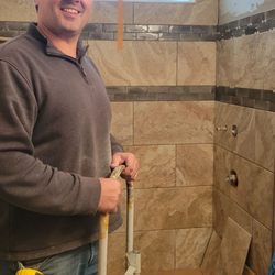 Rajala's Kitchens - Aaron remodeling a outdated bathroom.