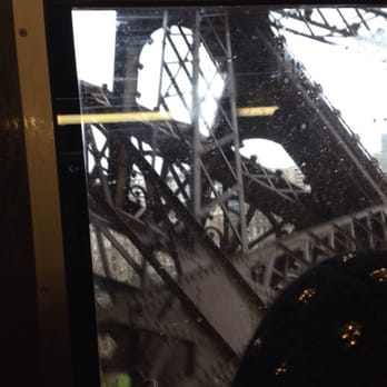 La Tour Eiffel - A glimpse through the elevator - Landmarks & Historical Buildings Near Me - Paris, 75 La Tour Eiffel - A glimpse through the elevator - Landmarks & Historical Buildings Near Me - Paris, 75