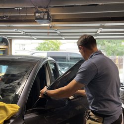 Noble Auto Styling - Mobile Window tint in action. We can tint right in your own garage with shop level quality.