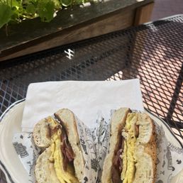 Bacon egg and cheese on an everything bagel Bacon egg and cheese on an everything bagel
