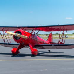 Austin Biplane - Open-cockpit biplane rides, aerobatic flights, romantic flights for 2, Austin air tours, Lake Travis sunset flights. ABIA.