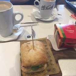 McDonald's - Halloumi burger on my baby cutting board with the salsa loaded fries