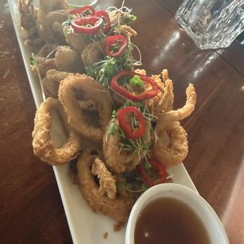 Haleiwa Beach House - Crispy calamari appetizer with sweet chili dipping sauce - Hawaiian Near Me - Haleiwa, Hawaii Haleiwa Beach House - Crispy calamari appetizer with sweet chili dipping sauce - Hawaiian Near Me - Haleiwa, Hawaii