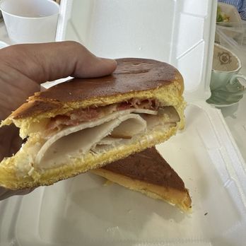 1928 Cuban Bistro - Fleming Island - The Elena Ruth Cuban Sandwich. Cream cheese, bacon, & guava preserves on medianoche bread (sweet bread) - Coffee & Tea Near Me - Fleming Island, Florida