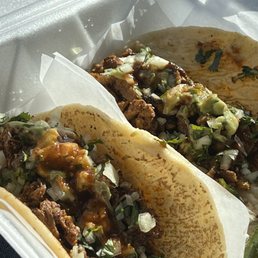 Al Pastor & Birria tacos made on fresh tortillas.