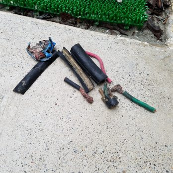 OC Concrete Stain - Electrical wire debris left in back yard. - Masonry/Concrete Near Me