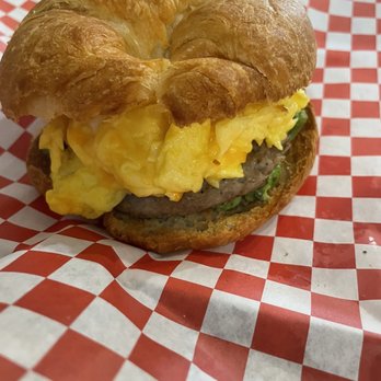 Kuumba Coffee - Breakfast sandwich. It has turkey sausage egg and avocado. You can choose to have it on a croissant or a bagel. - Coffee & Tea Near Me - Douglasville, Georgia Kuumba Coffee - Breakfast sandwich. It has turkey sausage egg and avocado. You can choose to have it on a croissant or a bagel. - Coffee & Tea Near Me - Douglasville, Georgia