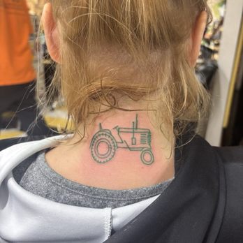 Royal Peacock Tattoo Parlor - Tractor in classic John Deere essence - Tattoo Near Me - Sacramento, California