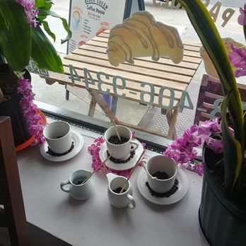 Black Sheep Coffee House - a table with coffee and pastries - Coffee & Tea Near Me - Queens, New York Black Sheep Coffee House - a table with coffee and pastries - Coffee & Tea Near Me - Queens, New York