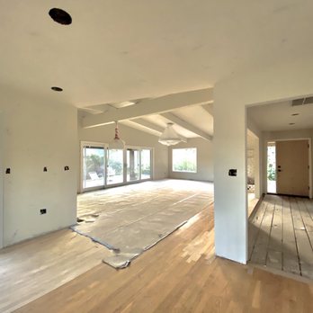 Costa Bella Builders - During: floors resurfaced & stained - General Contractors Near Me - Aptos, California