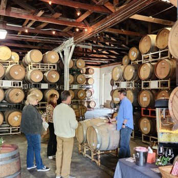 Foppiano Vineyards - a group of people in a wine cellar - Wineries Near Me - Healdsburg, California