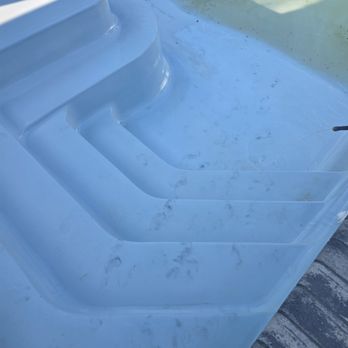 Pool and Deck Concepts - Black shoe prints all over pool when "finished". - Decks & Railing Near Me - Naples, Florida Pool and Deck Concepts - Black shoe prints all over pool when "finished". - Decks & Railing Near Me - Naples, Florida