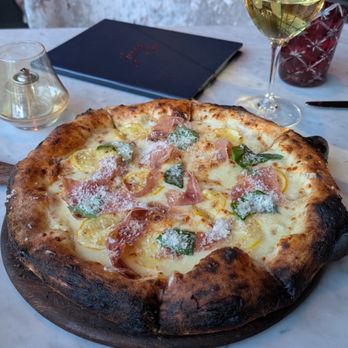 Luna By Giada - Delicious lemon pizza with added prosciutto - Italian Near Me - Scottsdale, Arizona Luna By Giada - Delicious lemon pizza with added prosciutto - Italian Near Me - Scottsdale, Arizona