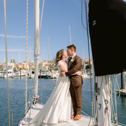 I Sail SF - Happy Bride and Groom on the bow of Carmelita