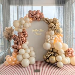 Fantasy Balloon Studio - Golden Hour Bridal Shower backdrop with gold and beige balloon garland at Sky Lounge Seattle