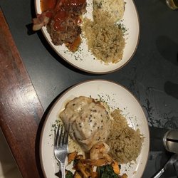 Palmer's Restaurant Bar & Courtyard - Bacon wrapped meatloaf, rice & mashed potatoes Redfish, chef's rice & a kale sweet potato mix