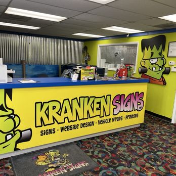 Kranken Signs Vehicle Wraps - Customer counter / service area at Kranken Signs. - Printing Services Near Me - Pineville, North Carolina Kranken Signs Vehicle Wraps - Customer counter / service area at Kranken Signs. - Printing Services Near Me - Pineville, North Carolina