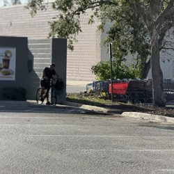 Violent guy who threatened me. staff allowed to charge his bike.
