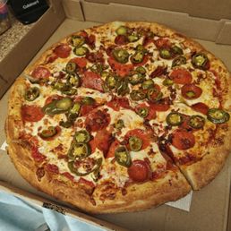 XL pizza with pepperoni, bacon & jalapenos. Arrived super hot and fresh! XL pizza with pepperoni, bacon & jalapenos. Arrived super hot and fresh!
