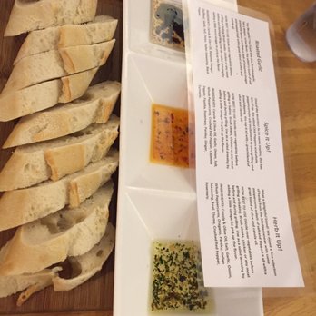 Urban Olive & Vine - Baguette and Olive Oil Board - New American Near Me - Hudson, Wisconsin Urban Olive & Vine - Baguette and Olive Oil Board - New American Near Me - Hudson, Wisconsin