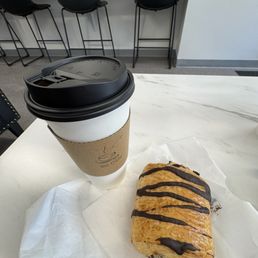 Drip coffee and chocolate croissant