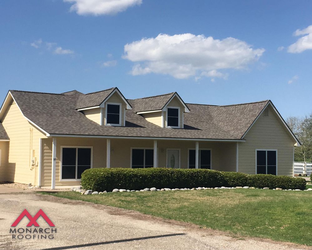 Slide of Monarch Roofing