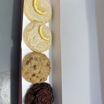 Crumbl - Madison - Lemon glaze, chocolate chip, and double chocolate frosted cookies. - Bakeries Near Me - Madison, Alabama Crumbl - Madison - Lemon glaze, chocolate chip, and double chocolate frosted cookies. - Bakeries Near Me - Madison, Alabama