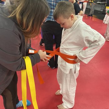Waverly Martial Arts - Son getting his Orange belt - Martial Arts Near Me - Patchogue, New York Waverly Martial Arts - Son getting his Orange belt - Martial Arts Near Me - Patchogue, New York