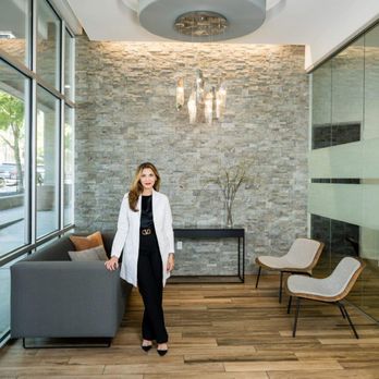 Downtown Dental Design - Austin dentist Dr. Negar Eslami in the modern, welcoming lobby of Downtown Dental Design - General Dentistry Near Me - Austin, Texas