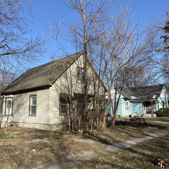 Mow N More - This was a recently purchased house and Trees grew up in front of the house . New owner wanted them removed and the whole yard cleaned up . - Lawn Services Near Me - Topeka, Kansas