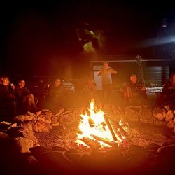 Rowe's Adirondack Cabins - Schroon Lake - An evening of stories, laughter, and bonding.