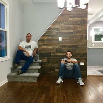 SilverBullet - two men sitting on stairs in a house - General Contractors Near Me SilverBullet - two men sitting on stairs in a house - General Contractors Near Me