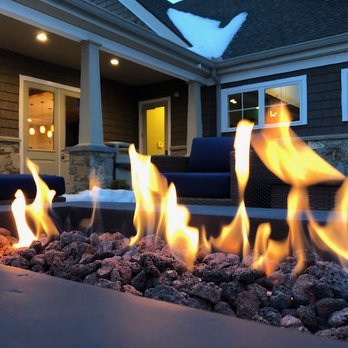 Canal Crossing - Baby, it's cold outside! Grab a mug of coffee in the clubhouse and chill by one of our fire pits. - Apartments Near Me - Hamden, Connecticut