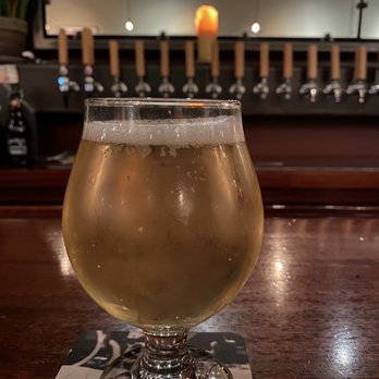 The Dirty Truth - a glass of beer on a bar - New American Near Me - Northampton, Massachusetts