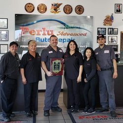 Perlu Advanced Auto Repair - Happy and proud crew.