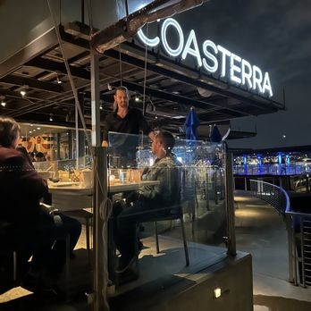 Coasterra - Our server Case talking fine wines with my companions - Mexican Near Me - San Diego, California