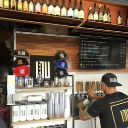 Inside - beer tender doing his thing. Solid selection and cool merch Inside - beer tender doing his thing. Solid selection and cool merch