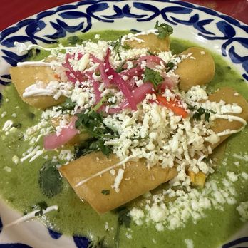 Mi Tierra Cafe & Bakery - Enchiladas Poblanos - Mexican Near Me - San Antonio, Texas Mi Tierra Cafe & Bakery - Enchiladas Poblanos - Mexican Near Me - San Antonio, Texas