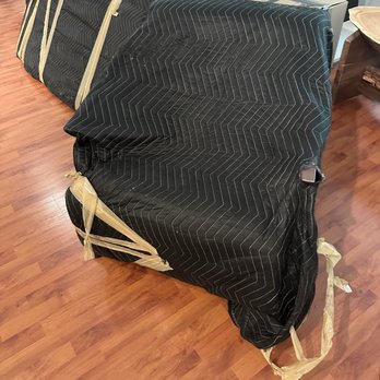 Texas Movers Group - How a chair was wrapped- notice the arm - Movers Near Me - Addison, Texas Texas Movers Group - How a chair was wrapped- notice the arm - Movers Near Me - Addison, Texas