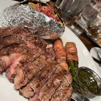 The Vault Uptown - Rib Eye with Bacon wrapped Asparagus loaded potato - New American Near Me - Sedona, Arizona The Vault Uptown - Rib Eye with Bacon wrapped Asparagus loaded potato - New American Near Me - Sedona, Arizona