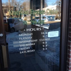 American Eyecare Center - Hours on door