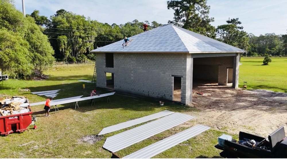 Slide of J Brothers Roofing